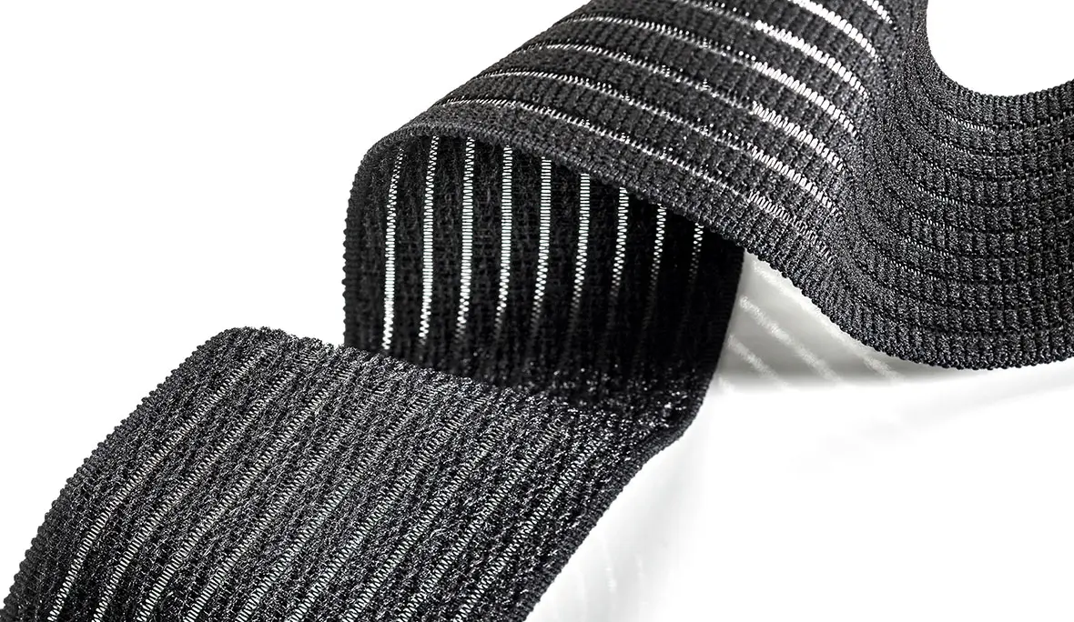 Textile Lösungen für Exoskelette - Bandagenband: hier schwarzes Klettfähiges Webband