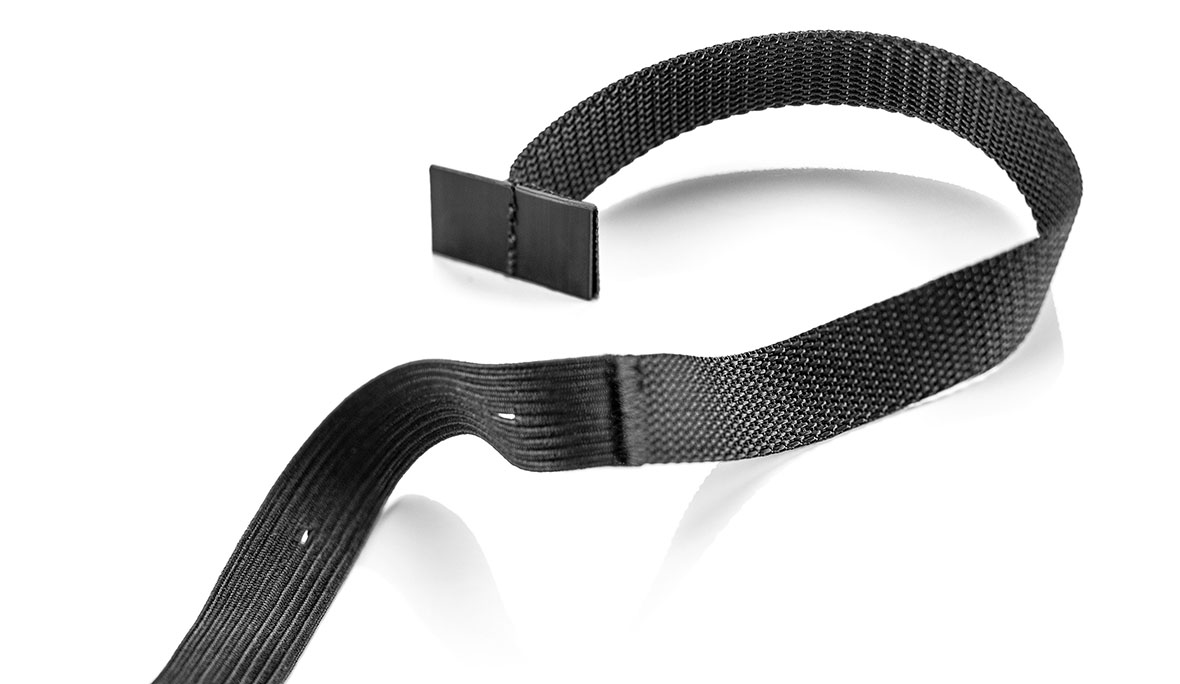 Funktionsband: Produktfoto eines schwarzen Funktionsbands vor weißem Hintergrund